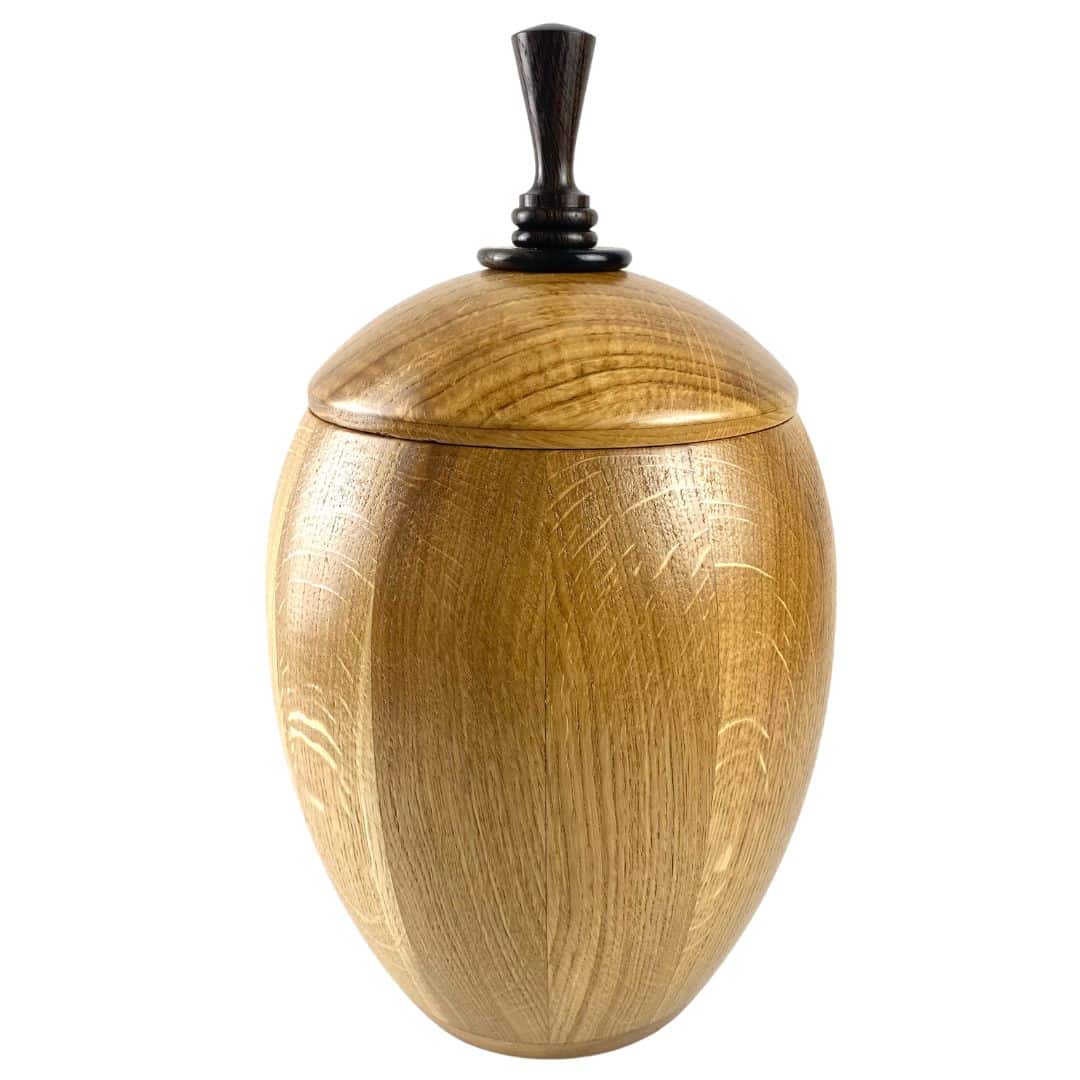 Oak dome irish urn with bog oak detailing on the lid