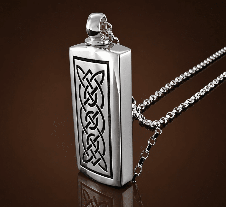 dogtag style silver pendant engraved with celtic knotwork